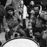 russell means beats a drum .jpg