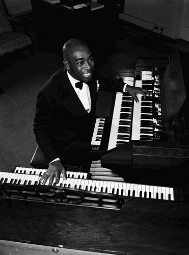Photograph, Graham W. Jackson Playing the Organ, November 14, 1947
