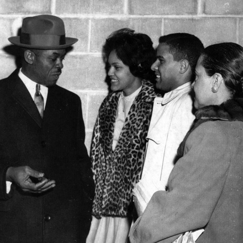 Photograph, Hamilton Holmes and Charlayne Hunter with attorney Donald Holowell, ca. 1960.